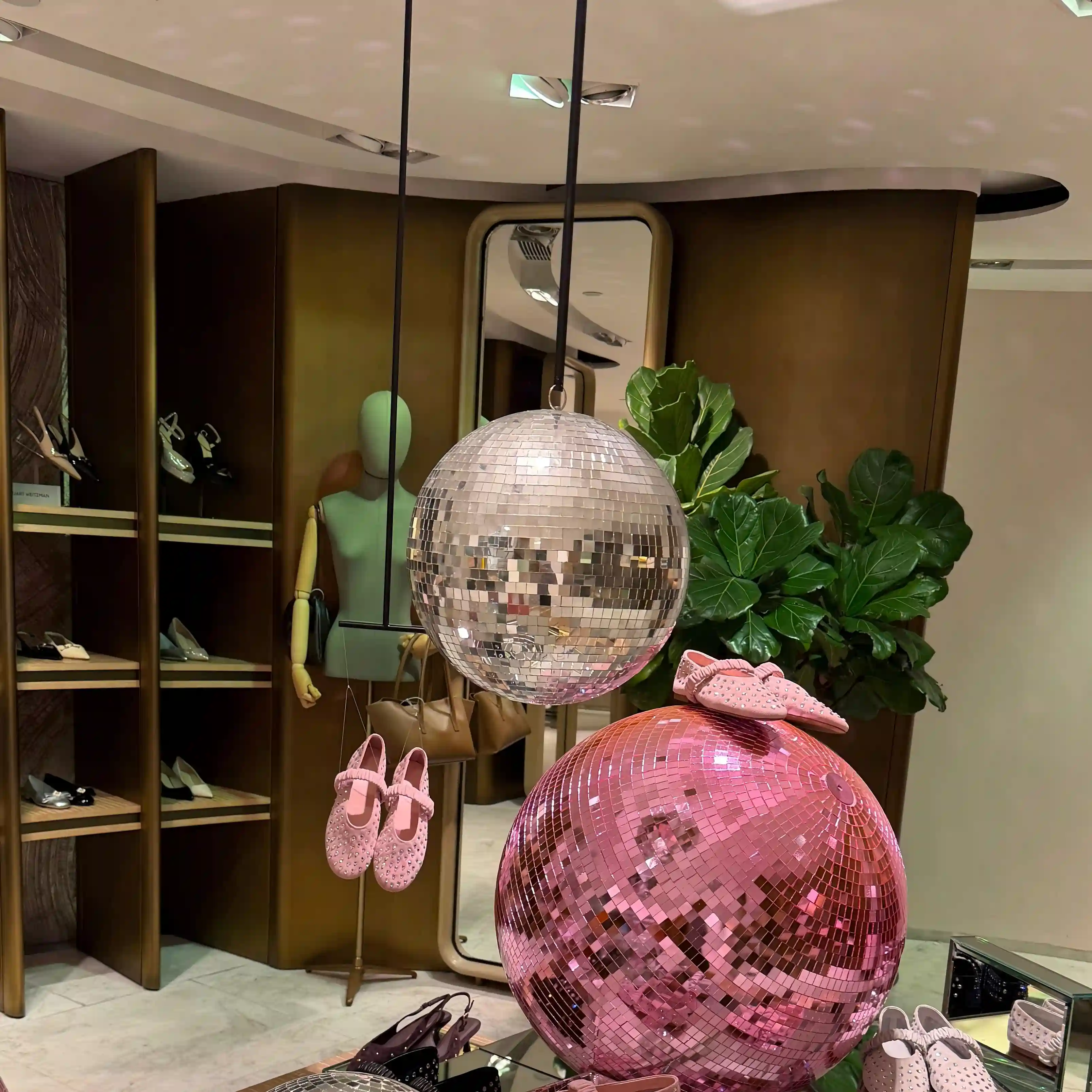 Retail display props with micro-prism surface refracting dynamic light